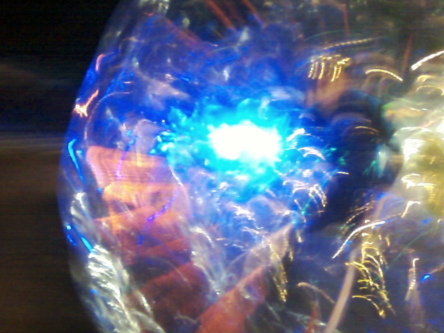 Lazer Man Running in Sphere